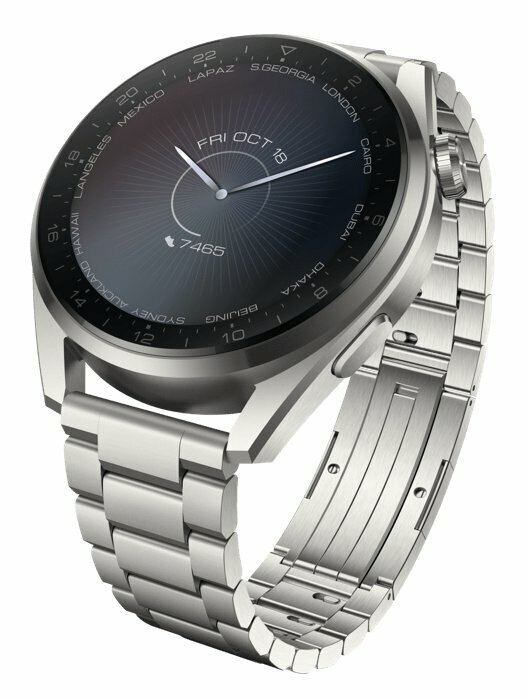 Srebrny smartwatch z metalową bransoletą i ciemną tarczą pokazującą czas światowy.