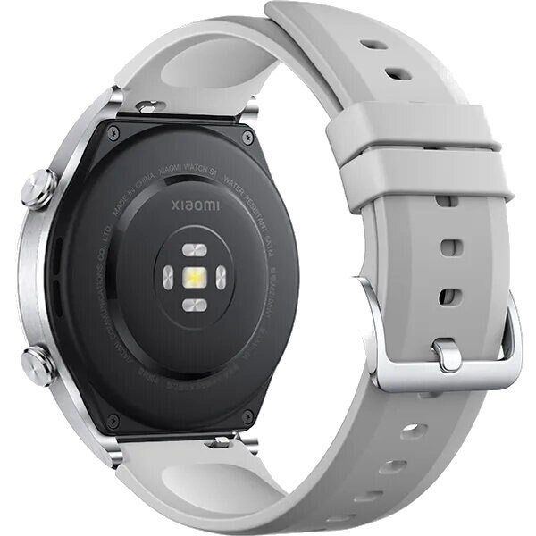 Tył szarego smartwatcha Xiaomi ze srebrnymi przyciskami i czujnikiem tętna.