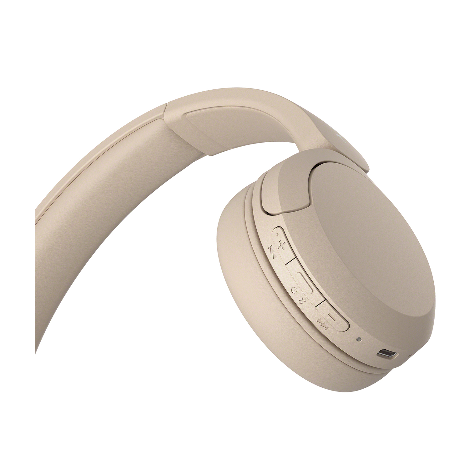 Cuffie beige su sfondo bianco, angolate per mostrare il padiglione.