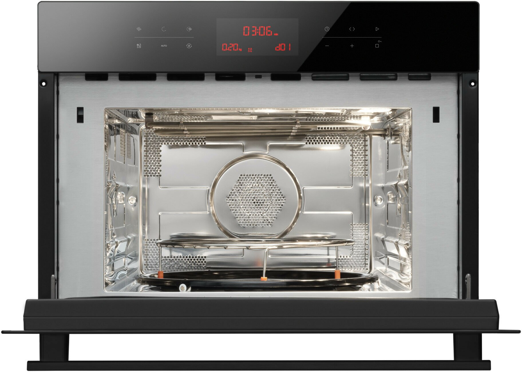 Wnętrze kuchenki mikrofalowej z otwartymi drzwiami, pokazujące wewnętrzne elementy.