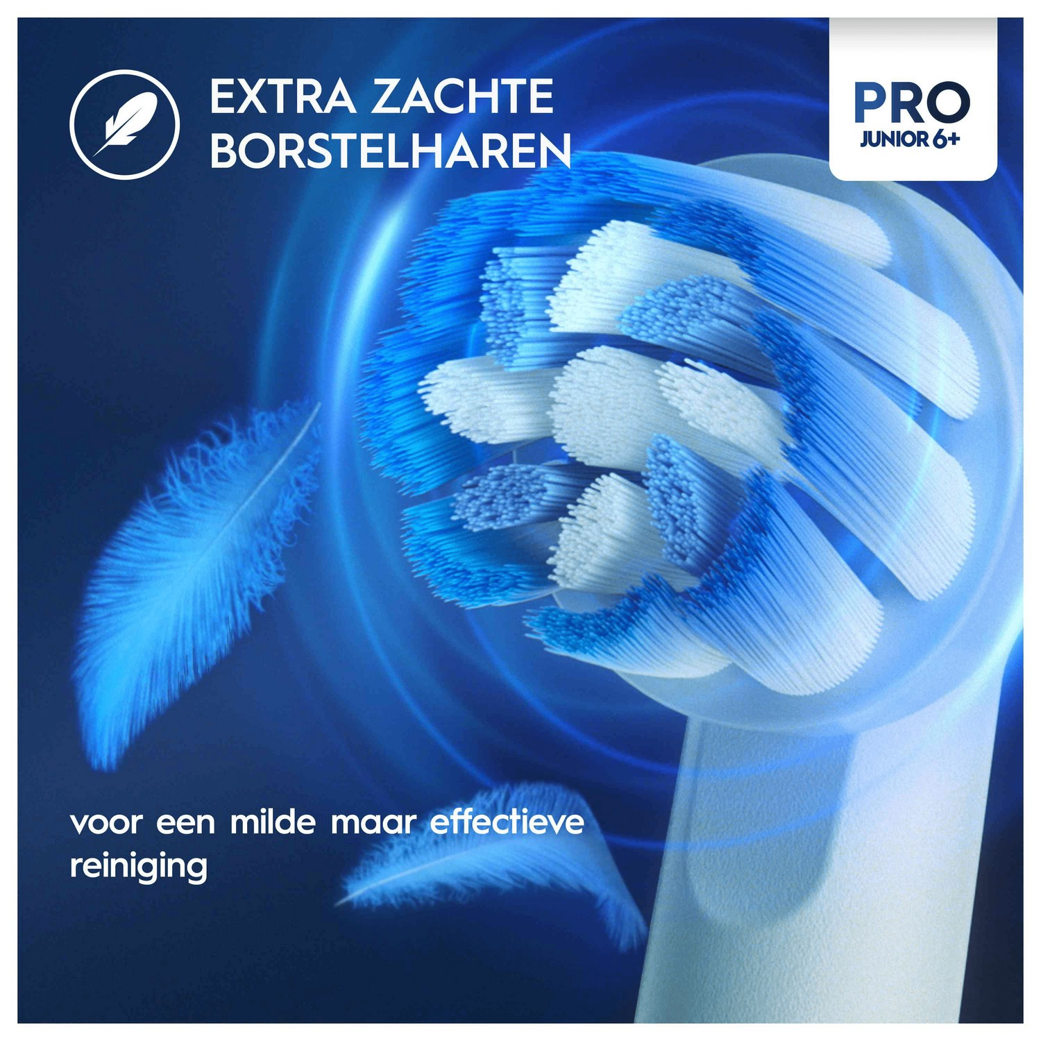 Close-up of a blue and white toothbrush head with text: 'EXTRA ZACHTE BORSTELHAREN'.