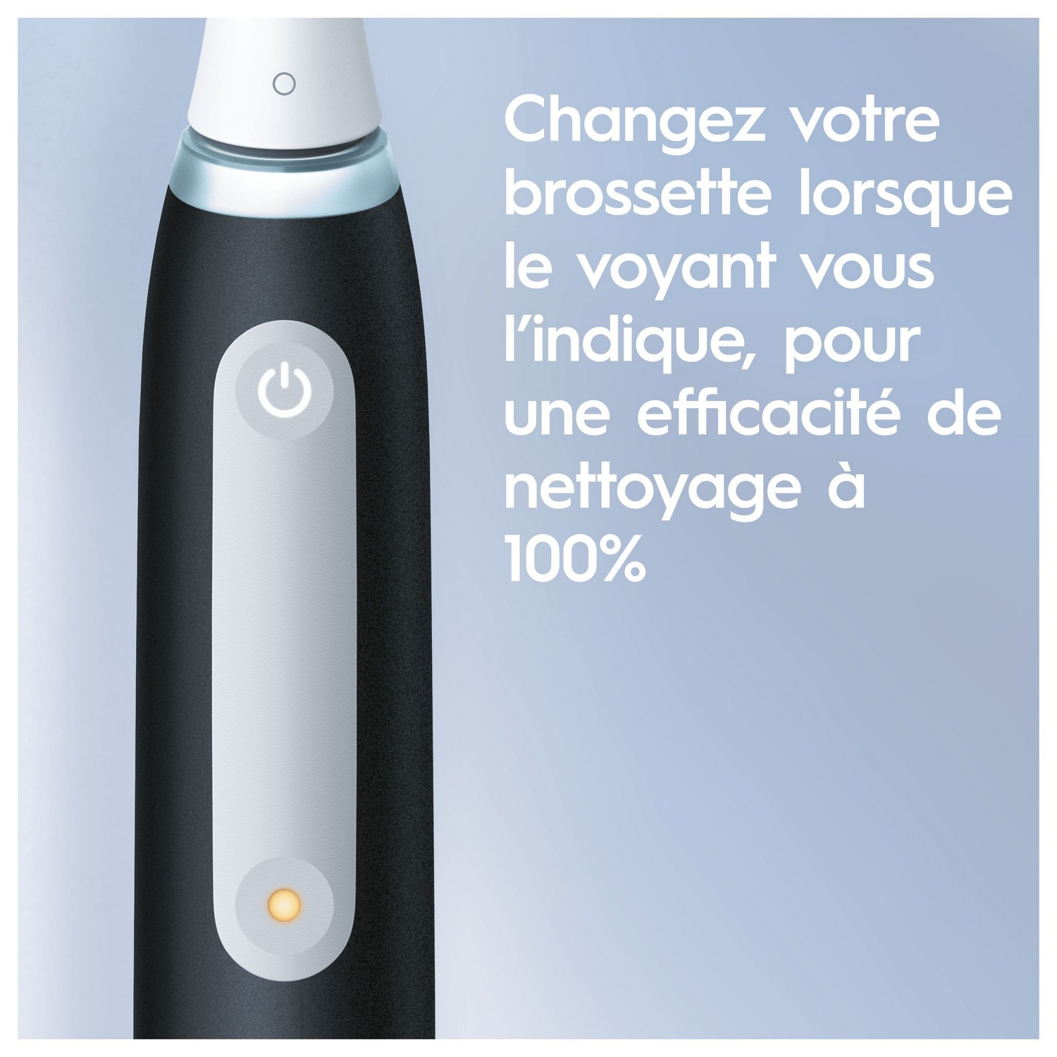 Brosse à dents électrique noire et blanche avec indicateur d'alimentation et de charge.