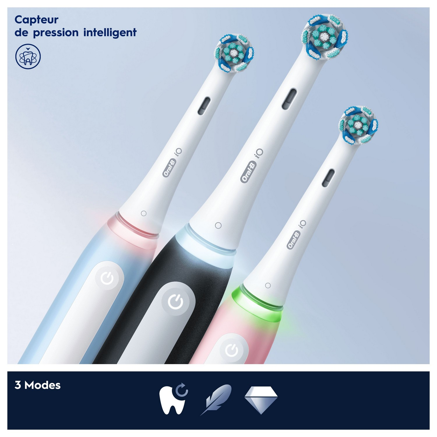 Trois brosses à dents électriques, différentes couleurs, avec indicateurs de mode éclairés.