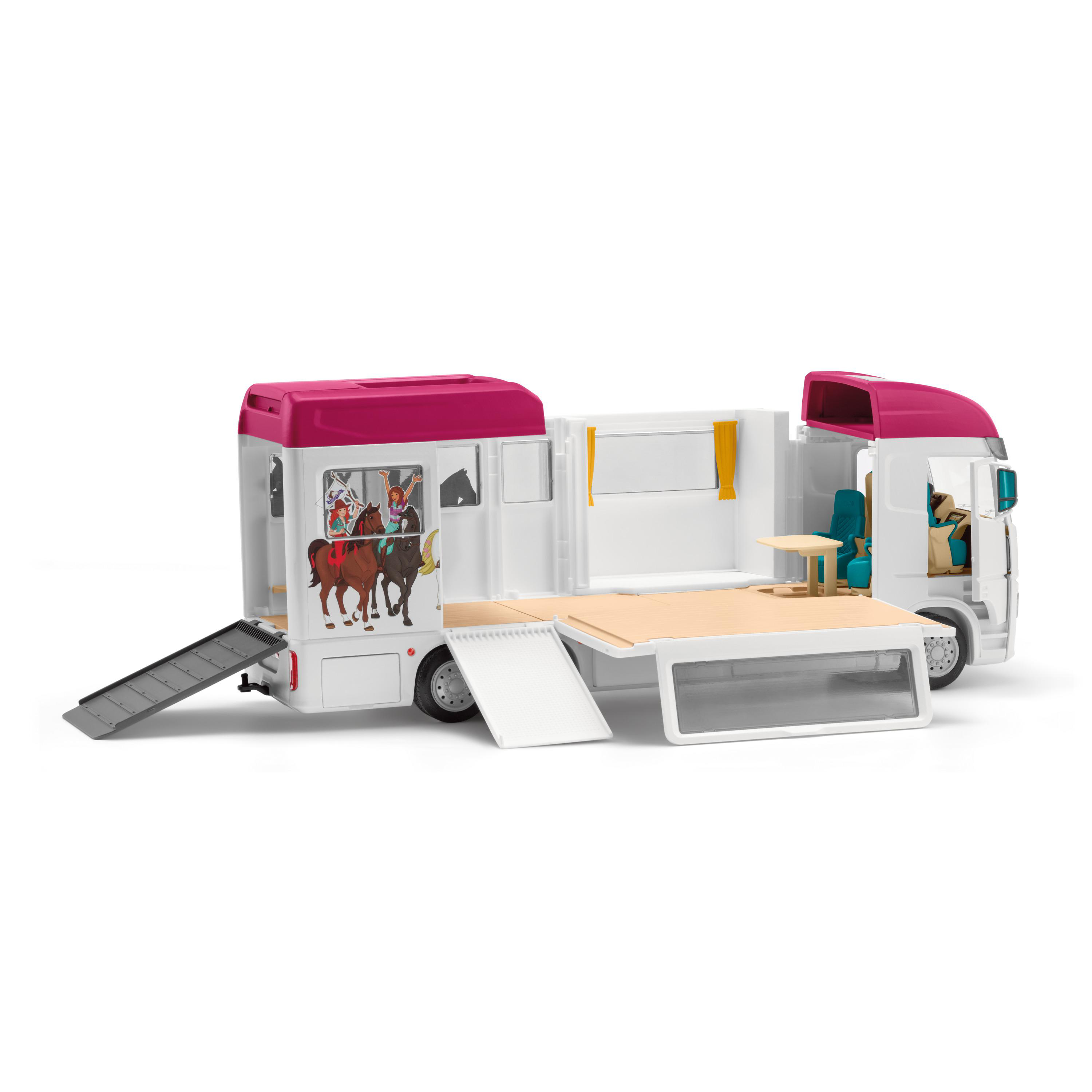 Ein weißer und rosa Pferdetransporter mit offenen Türen, der ein Pferd und Innendetails zeigt.