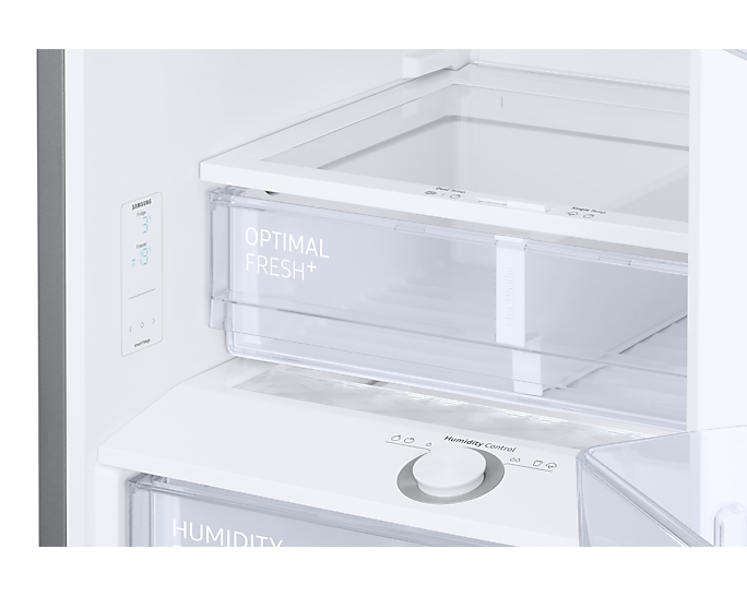 Egy fehér hűtőszekrény belsejében átlátszó fiókok láthatók, melyek 'Optimal Fresh+' és 'Humidity Control' feliratúak.