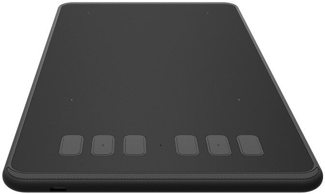 Czarny tablet z przyciskami. Jest to tablet graficzny.