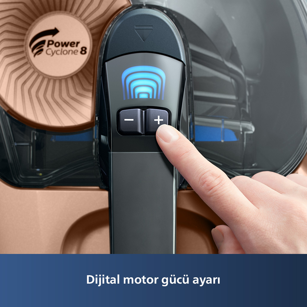 Bir elin bir elektrik süpürgesinin güç ayarını ayarlamasının yakın çekimi.