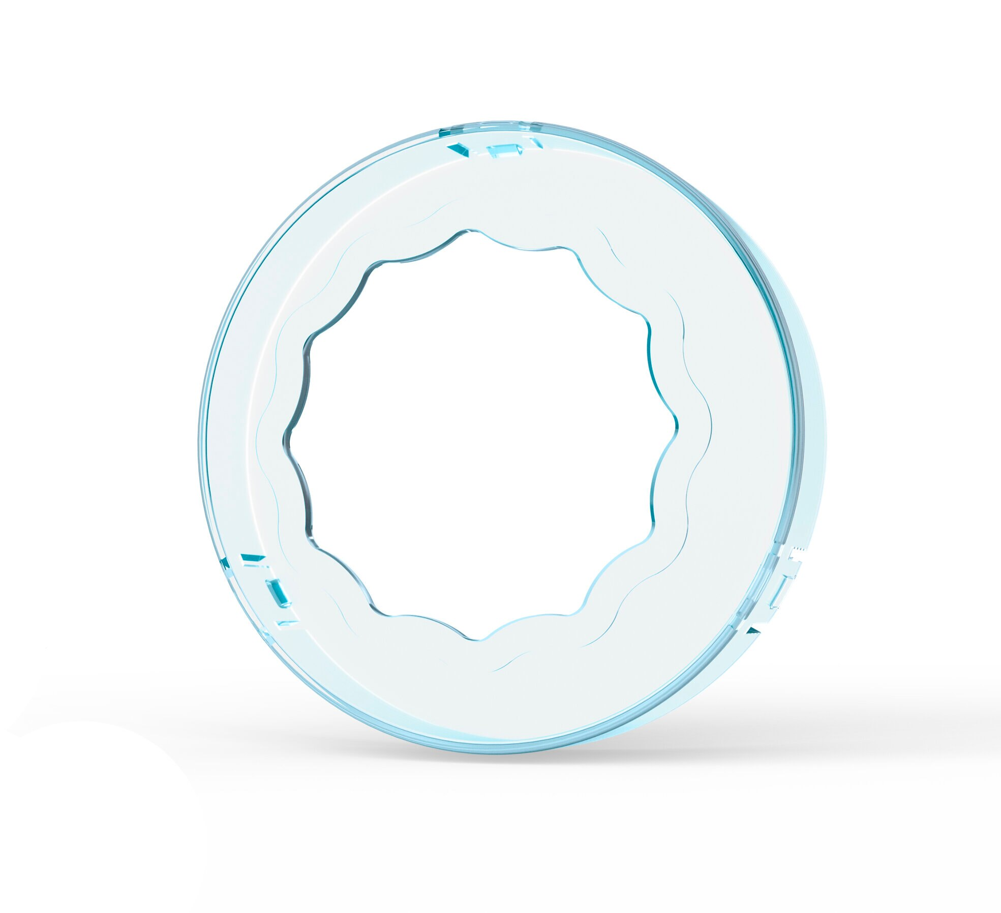 Przezroczysty, okrągły, niebieski obiekt z falistą wewnętrzną krawędzią.