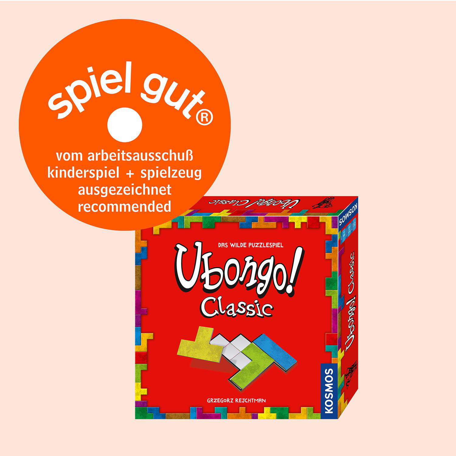 Eine Schachtel des Spiels Ubongo! Classic mit bunten Formen, ein runder, orangefarbener Aufkleber, rosa Hintergrund.