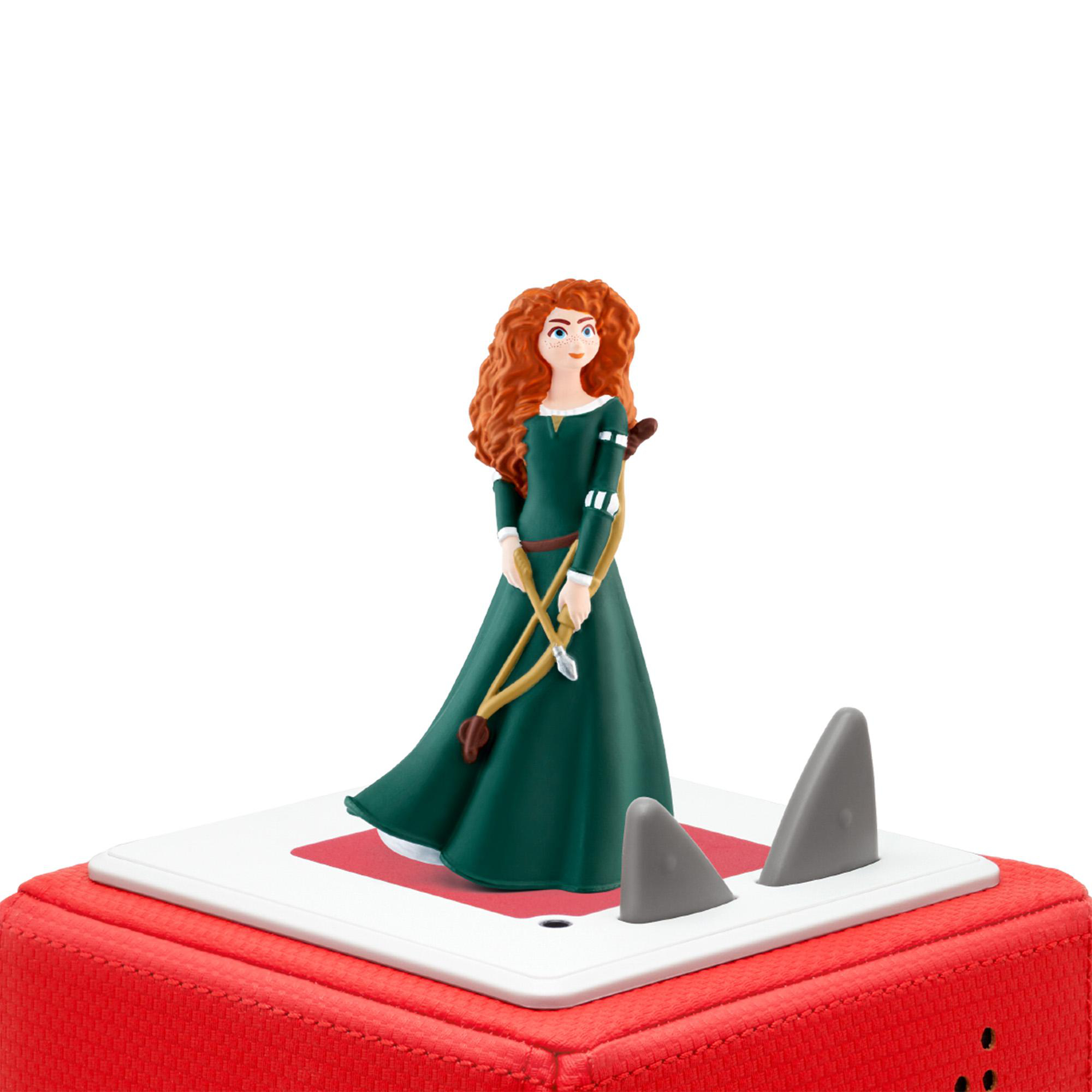 Merida-Puppe mit Pfeil und Bogen auf roter Basis mit haifischflossenartigen Strukturen.
