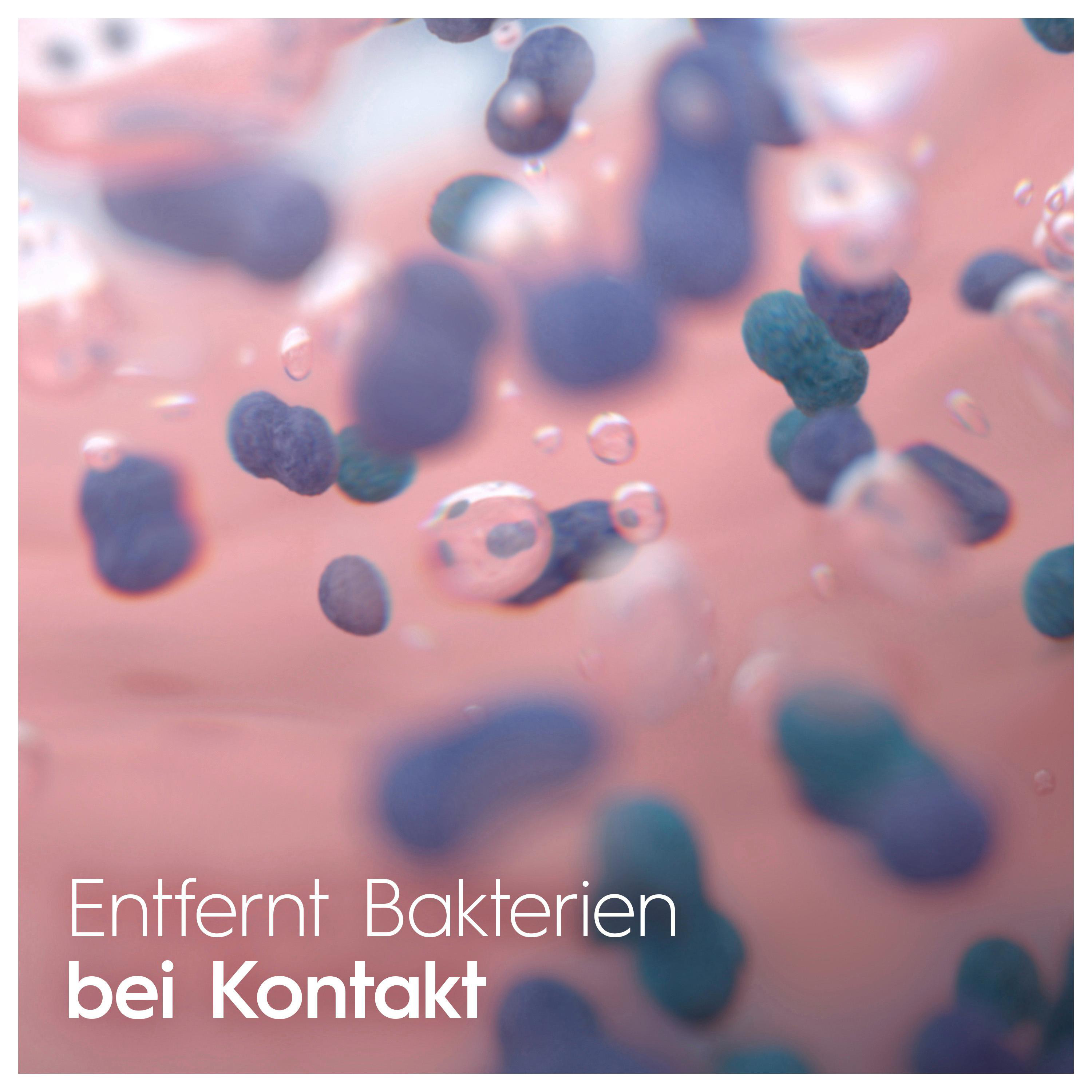 Bild von Bakterien und Wassertropfen auf rosa Hintergrund. Text sagt: Entfernt Bakterien bei Kontakt.