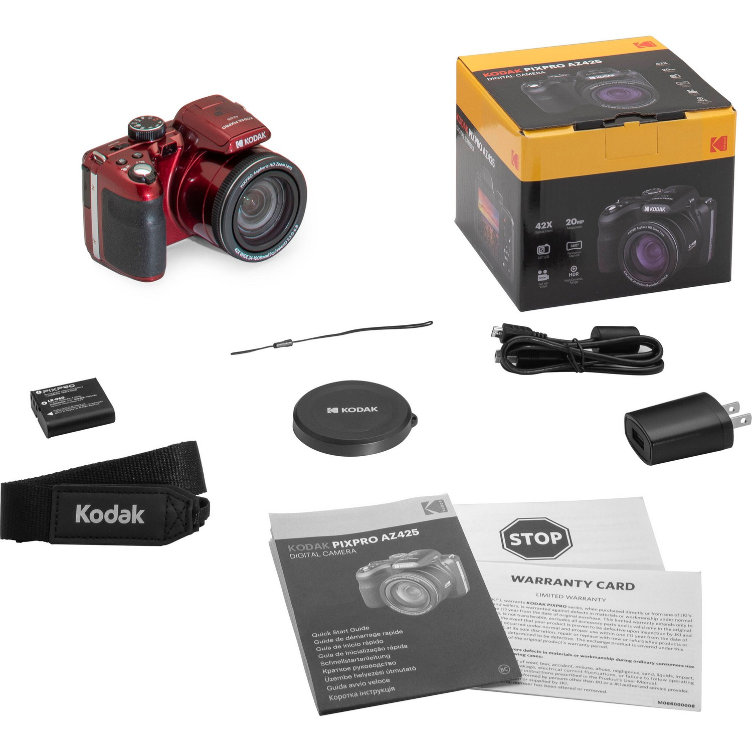 Kodak digitale camera met accessoires, inclusief doos, oplader en riem.