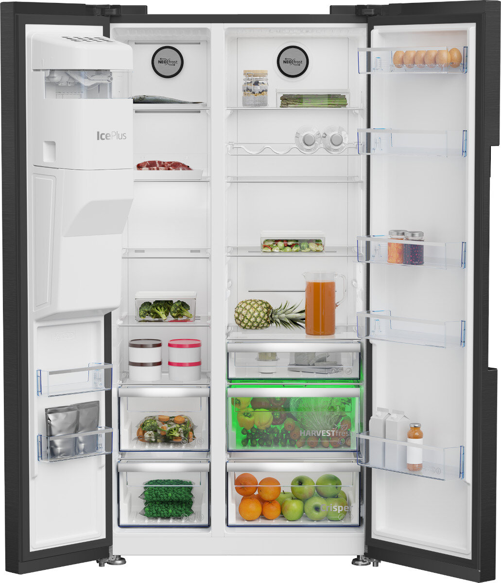 Wnętrze lodówki z produktami spożywczymi, zamrażarką i komorą IcePlus.