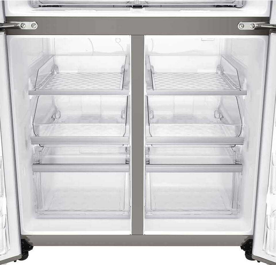 Wnętrze lodówki, pokazujące przezroczyste półki i szuflady.