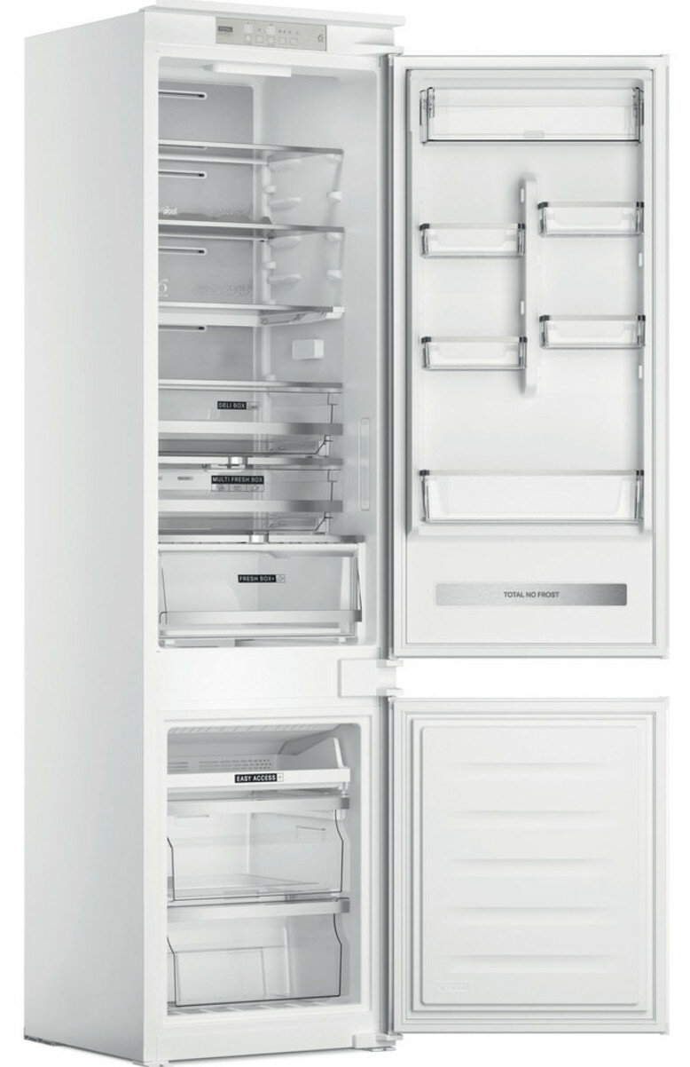 Biała lodówka Whirlpool, otwarta. Półki z jedzeniem i szuflady. Zamrażalnik na dole. Etykieta Total No Frost.