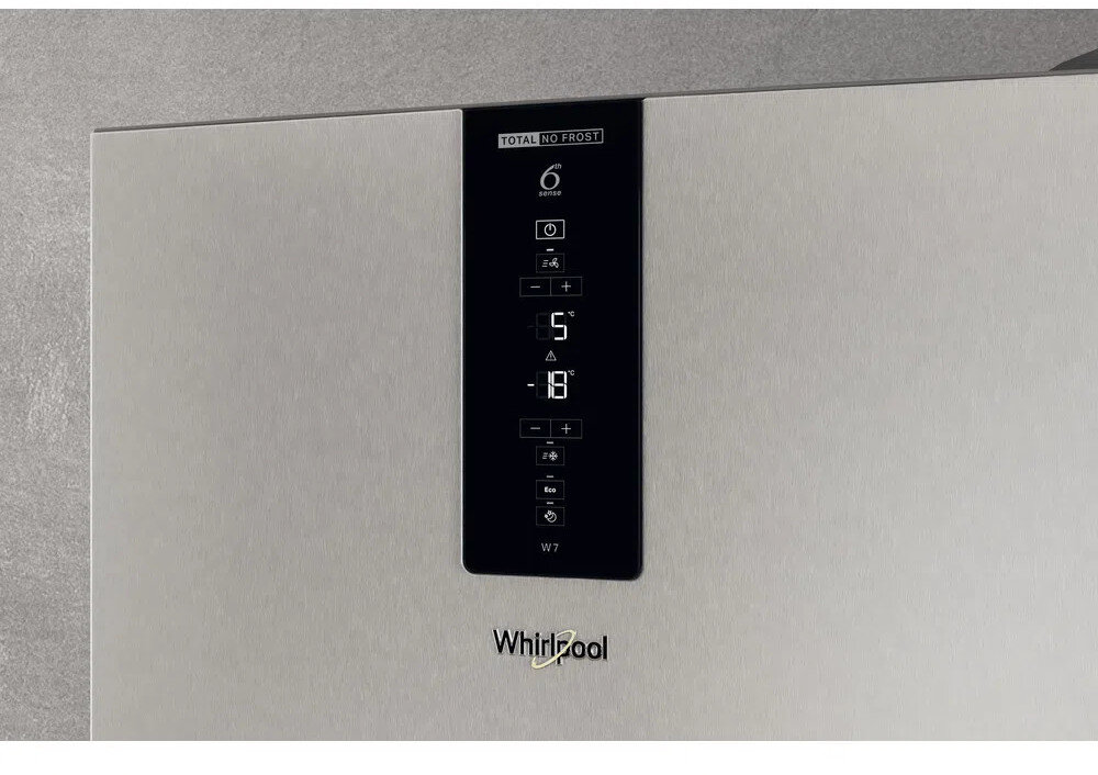 Panel sterowania lodówki Whirlpool. Wyświetla temperaturę i ustawienia, z cyfrowym wyświetlaczem i przyciskami.