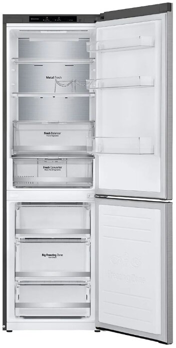 Otwarta biała lodówka Beko, wypełniona jedzeniem.