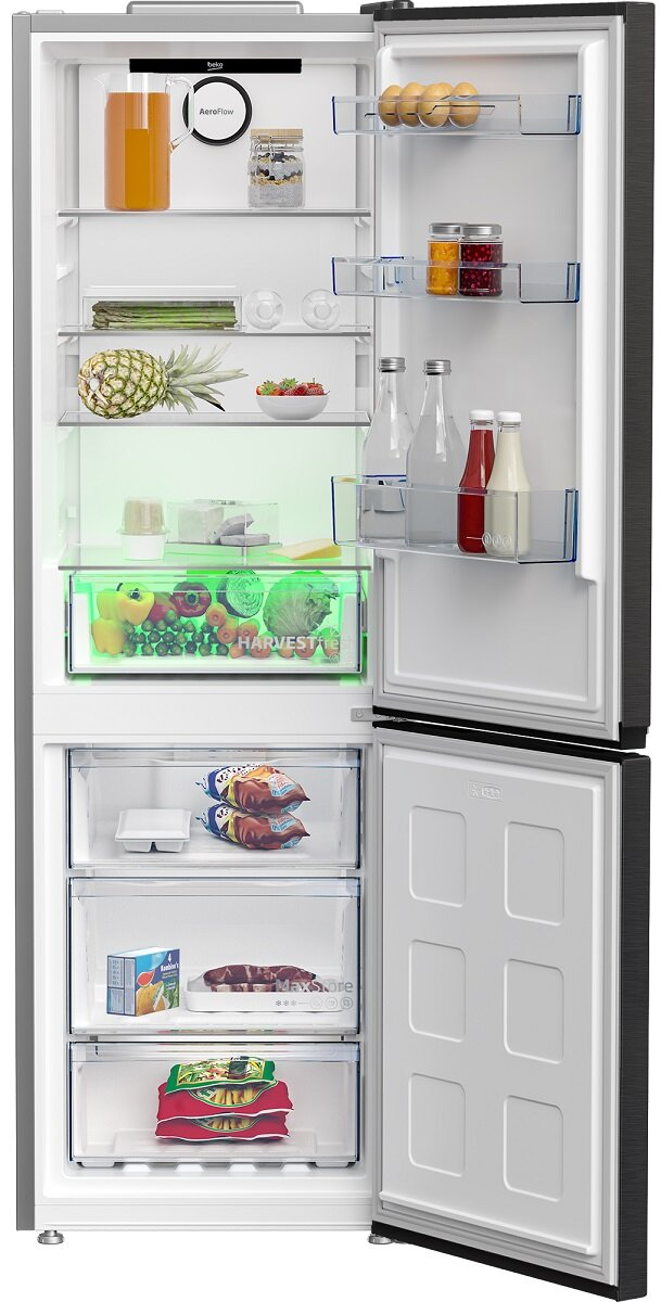 Otwarta lodówka Beko z różnymi przedmiotami na półkach, w tym owoce i warzywa.