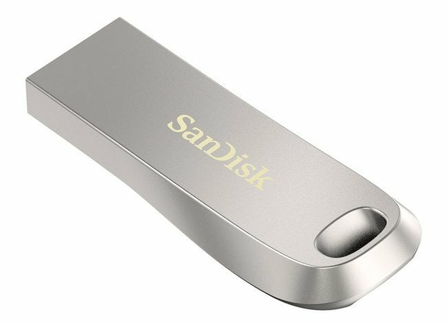 Srebrny pendrive SanDisk USB z otworem na smycz.