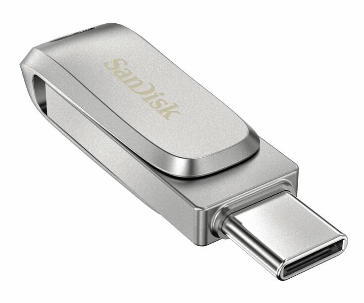 Srebrno-szary pendrive SanDisk, złącze Type-C, ujęcie pod kątem.
