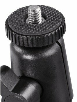 Czarna głowica statywu aparatu z śrubą na górze.