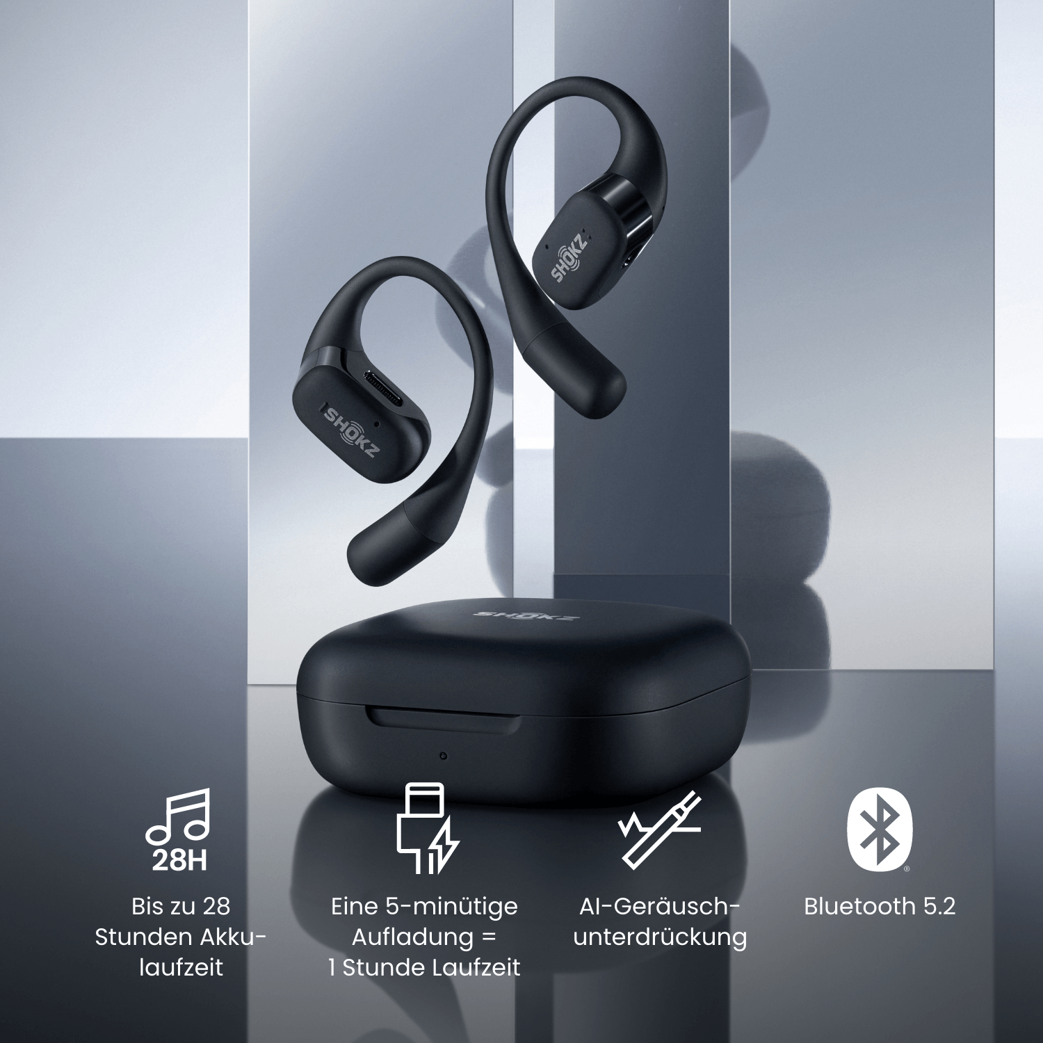Schwarze Shokz-Ohrhörer mit Ladecase. Funktionen: 28h Akku, 5-Minuten-Ladung für 1h Nutzung, KI-Geräuschunterdrückung, Bluetooth 5.2.