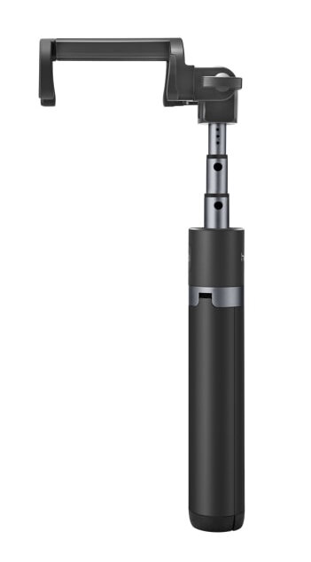 Czarny kij do selfie z wysuniętym uchwytem na telefon.