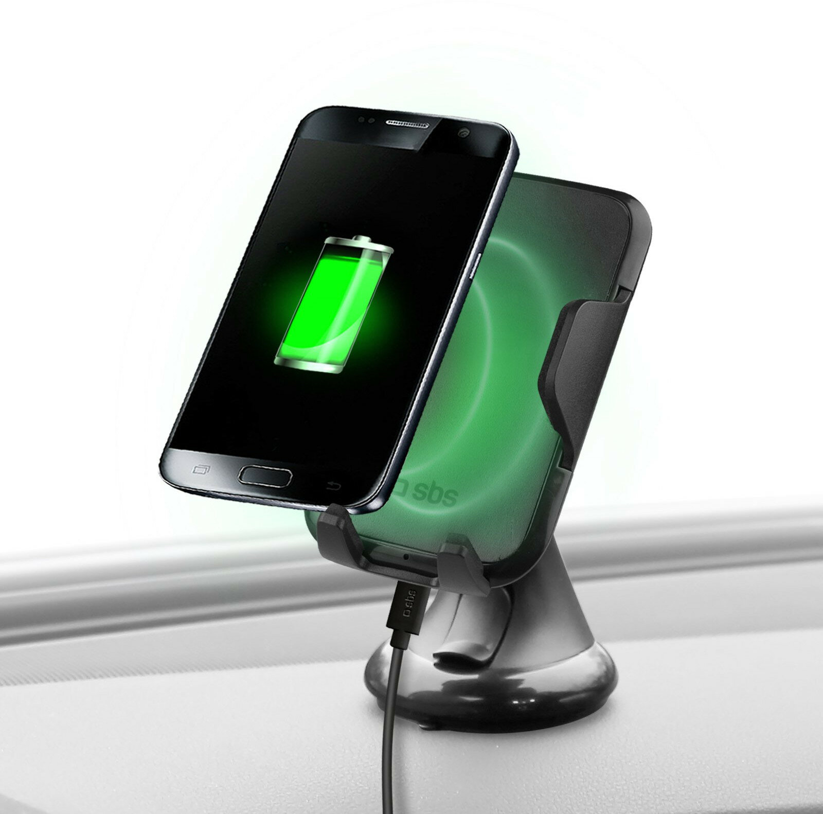 Czarny smartfon ładujący się bezprzewodowo na podkładce ładującej. Telefon pokazuje zieloną ikonę baterii.