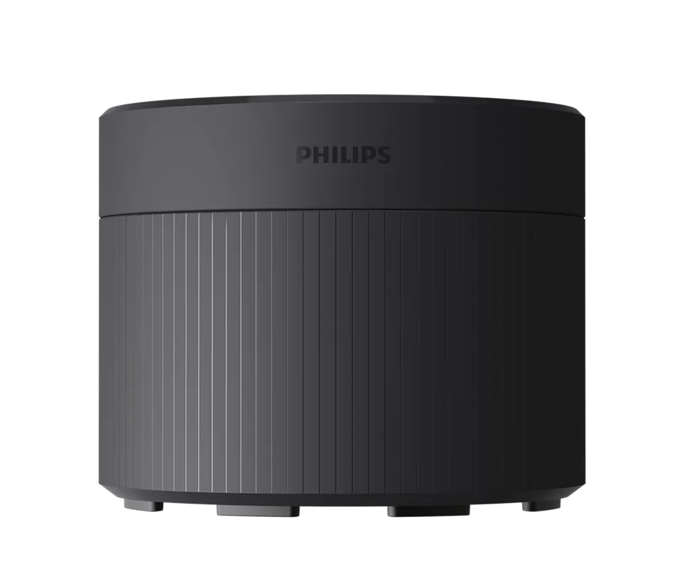 Schwarzer, zylindrischer Lautsprecher. Der Markenname Philips steht oben. Vertikale Rillen an der Seite.