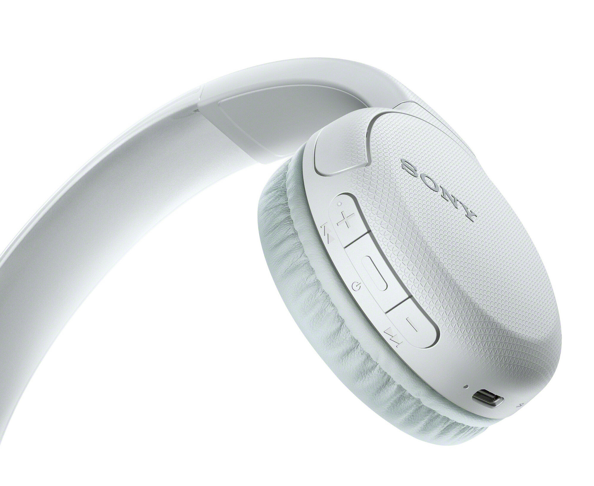 Białe słuchawki z przyciskami sterowania, miękką poduszką na białym tle.