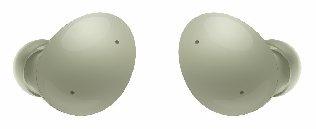 Dwa jasne słuchawki douszne. Są w zbliżeniu. Słuchawki douszne są obok siebie.