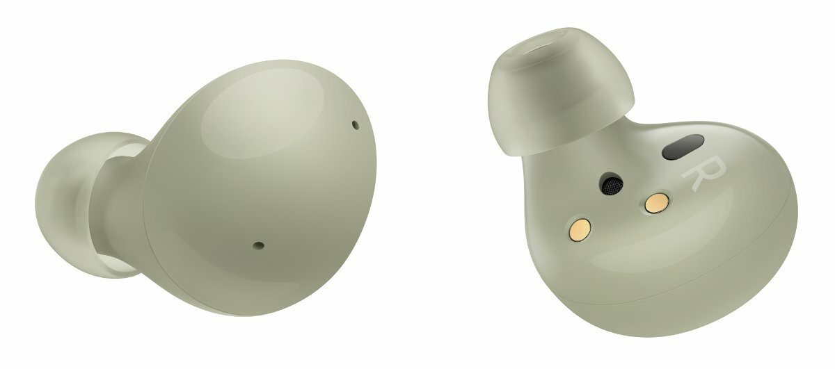 Dwie oliwkowozielone słuchawki douszne, jedna z oznaczeniem 'R' i szczegółami wewnętrznymi, na białym tle.