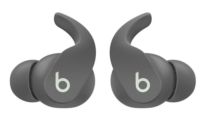 Dwa szare słuchawki Beats. Każda słuchawka ma białe logo 'b'. Są skierowane w stronę widza.