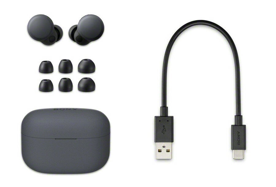 Słuchawki, etui ładujące i kabel USB-C. Wszystko w ciemnoszarym na białym tle.