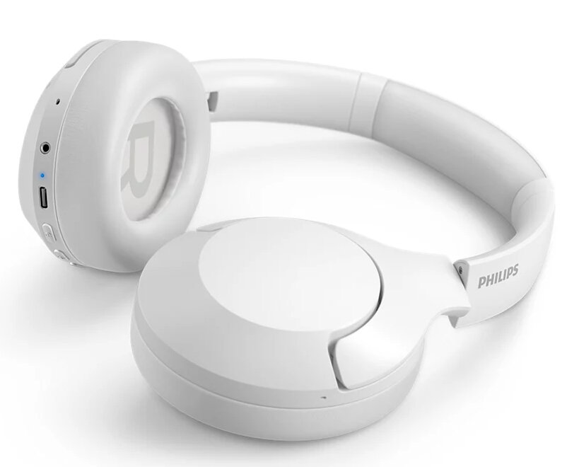 Białe słuchawki na białej powierzchni. Prawy nausznik jest widoczny. Słowo Philips jest na pałąku.