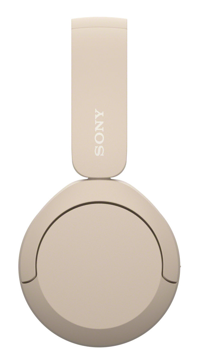 Beżowe słuchawki Sony, widok z góry, z białym logo Sony. Beżowe tło.