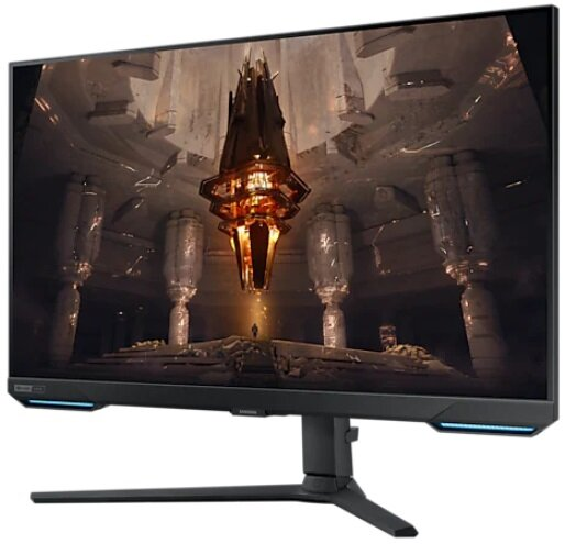 Duży, zakrzywiony monitor wyświetlający szczegółową, złotą scenę z gry.