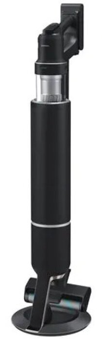 Czarny odkurzacz bezprzewodowy Samsung. Cylindryczny korpus, kątowa podstawa i stacja ładująca.