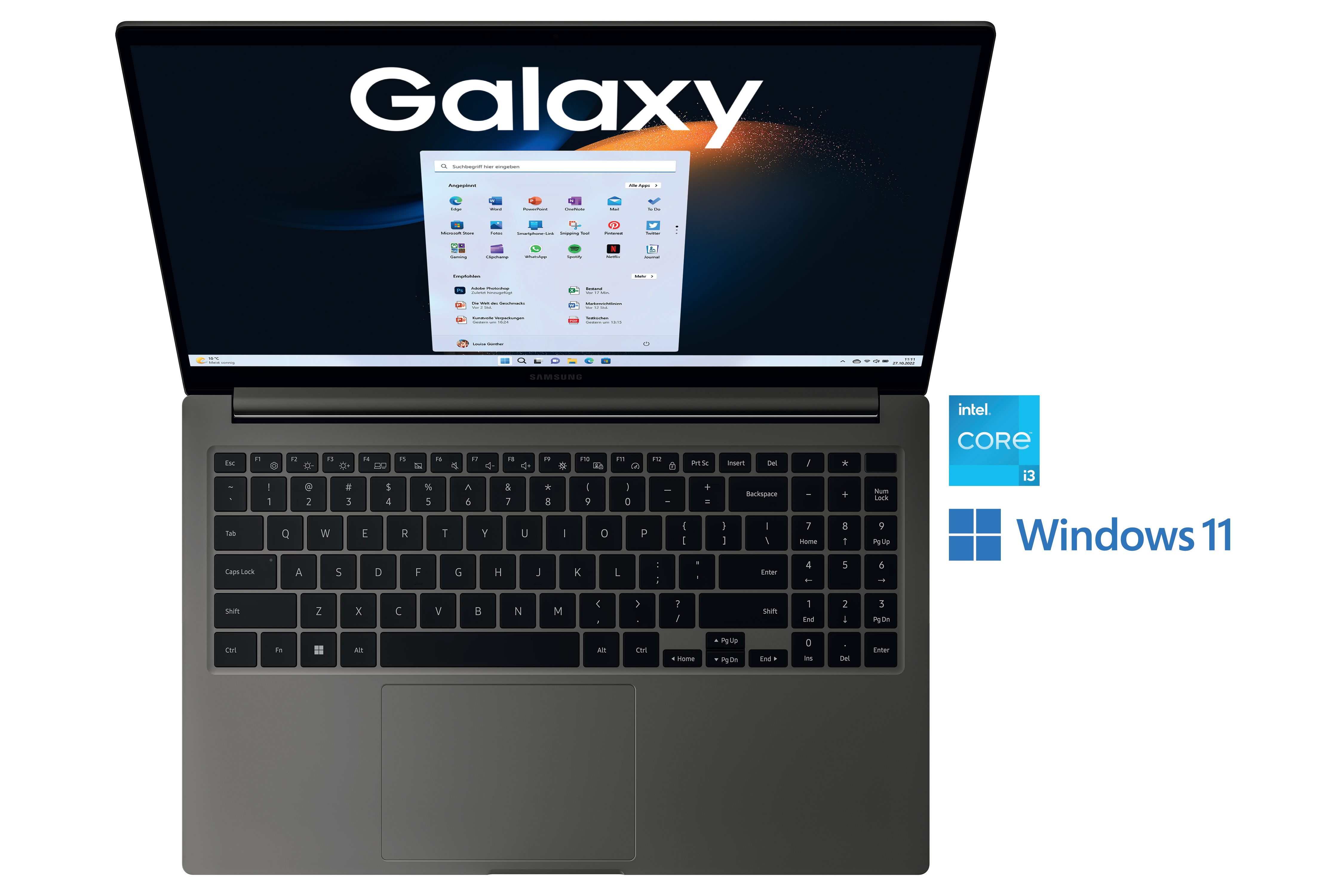 Draufsicht auf einen grauen Laptop mit Windows 11-Bildschirm. Das Wort Galaxy steht darauf.