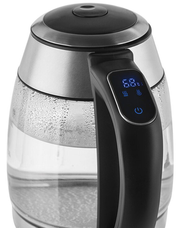 Zbliżenie przezroczystego szklanego czajnika elektrycznego z czarnym uchwytem.