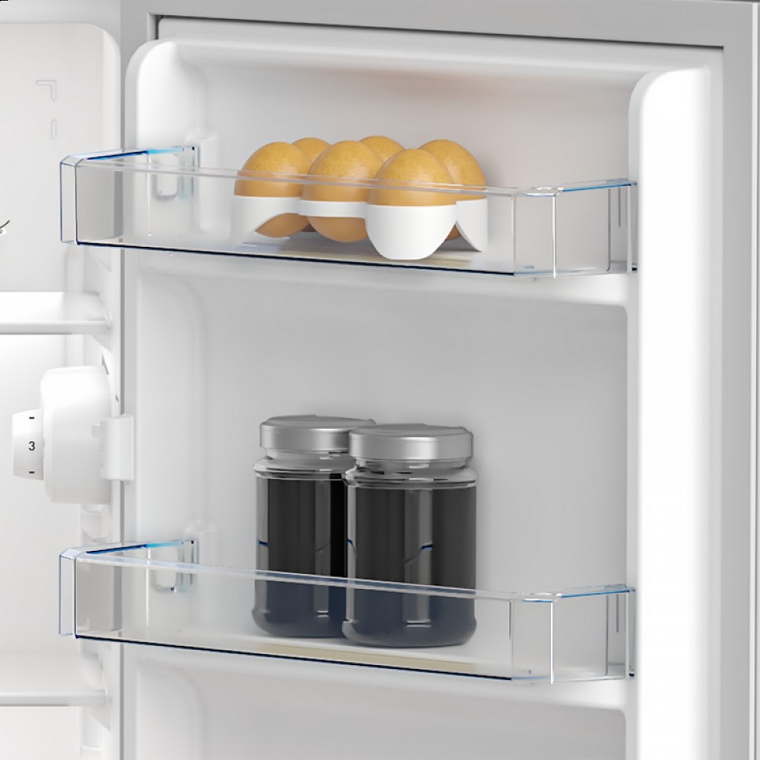 A fridge interior with two shelves, the top holds eggs, the bottom holds jars.