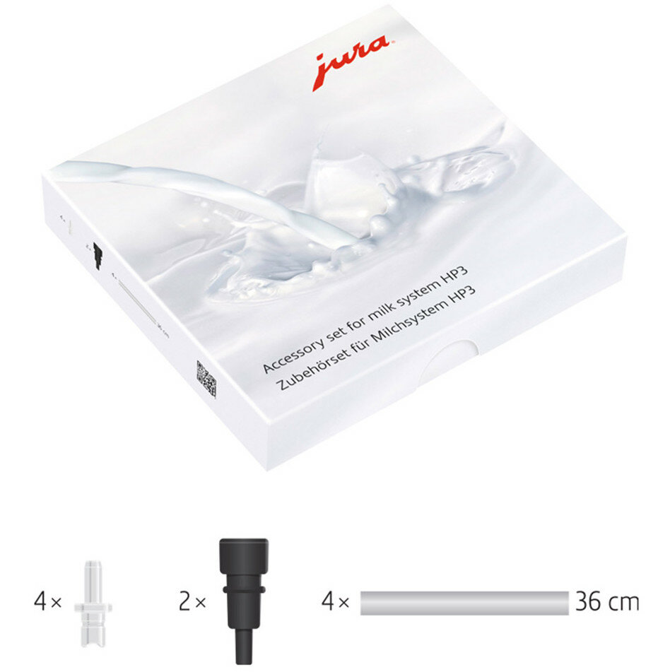 Białe pudełko z zestawem akcesoriów do systemu mlecznego i komponentami.