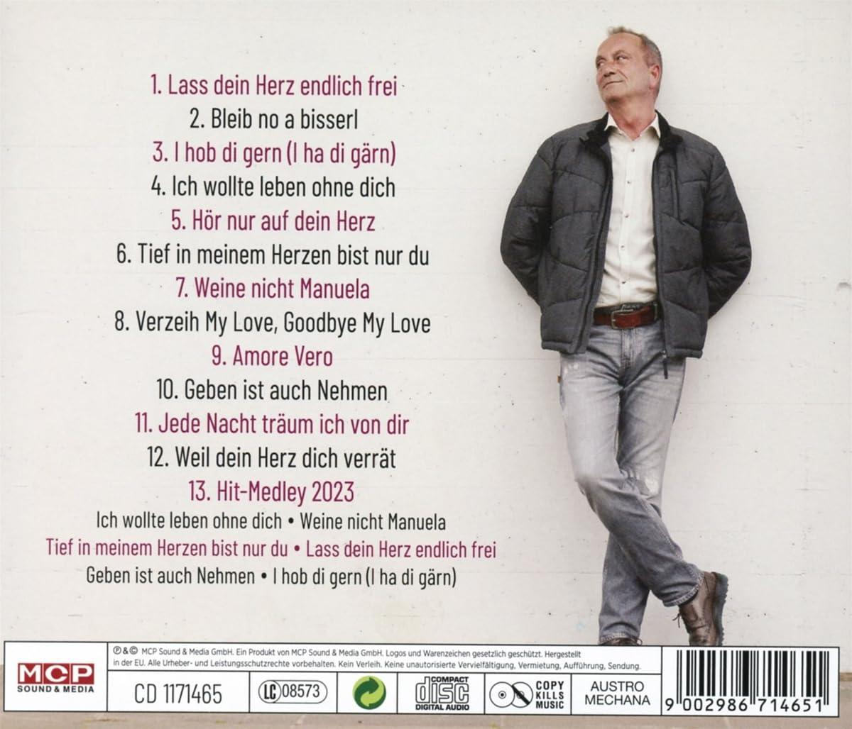 Rückseite einer CD mit Mann in Jacke, Texten und deutschem Text. Titel: Hit-Medley 2023.
