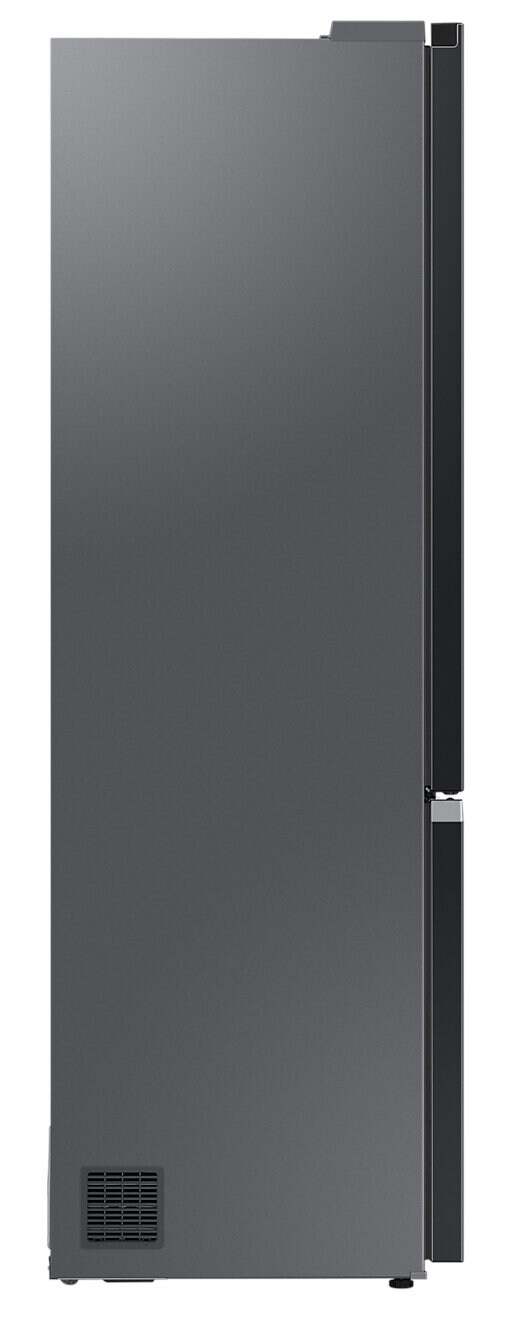 Widok z boku ciemnoszarej lodówki. Drzwi mają uchwyt i otwór wentylacyjny na dole.