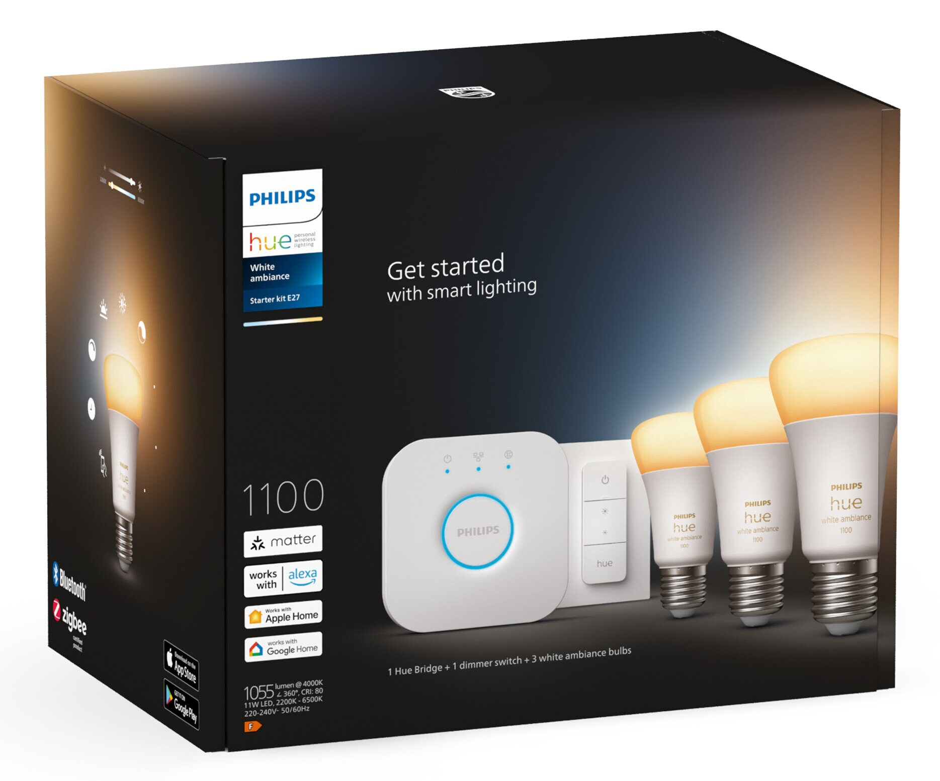 Zapakowany zestaw oświetlenia Philips Hue z mostkiem, ściemniaczem i trzema żarówkami.