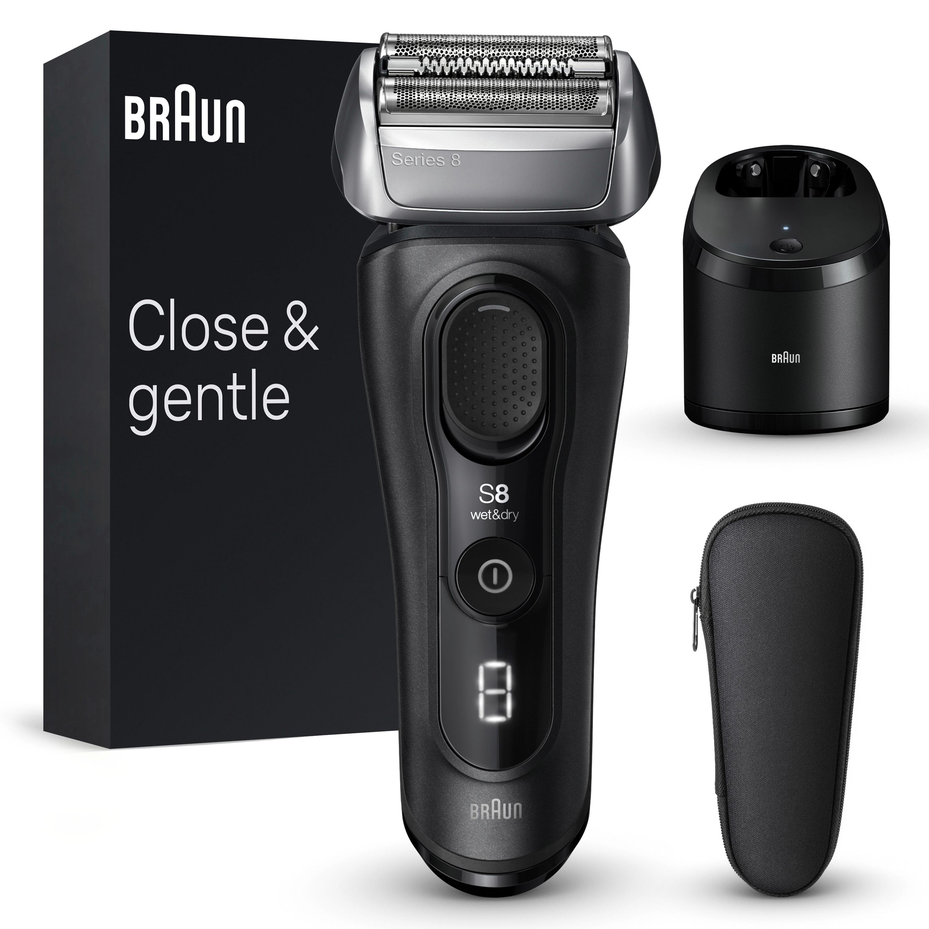 Schwarzer elektrischer Rasierer Braun Series 8 mit Zubehör: Box, Ladestation und Beutel.
