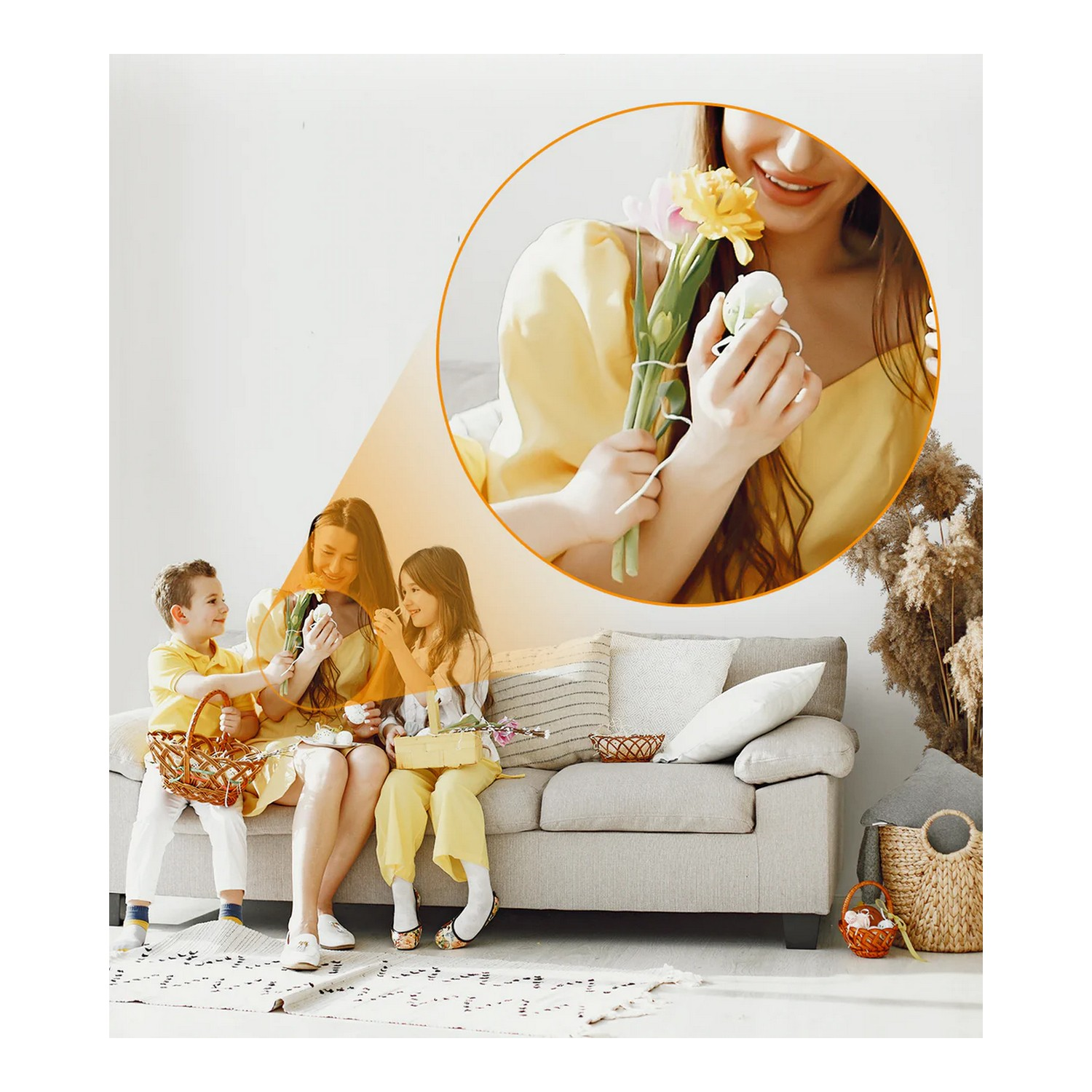 A woman and two children sitting on a couch, holding flowers and eggs.