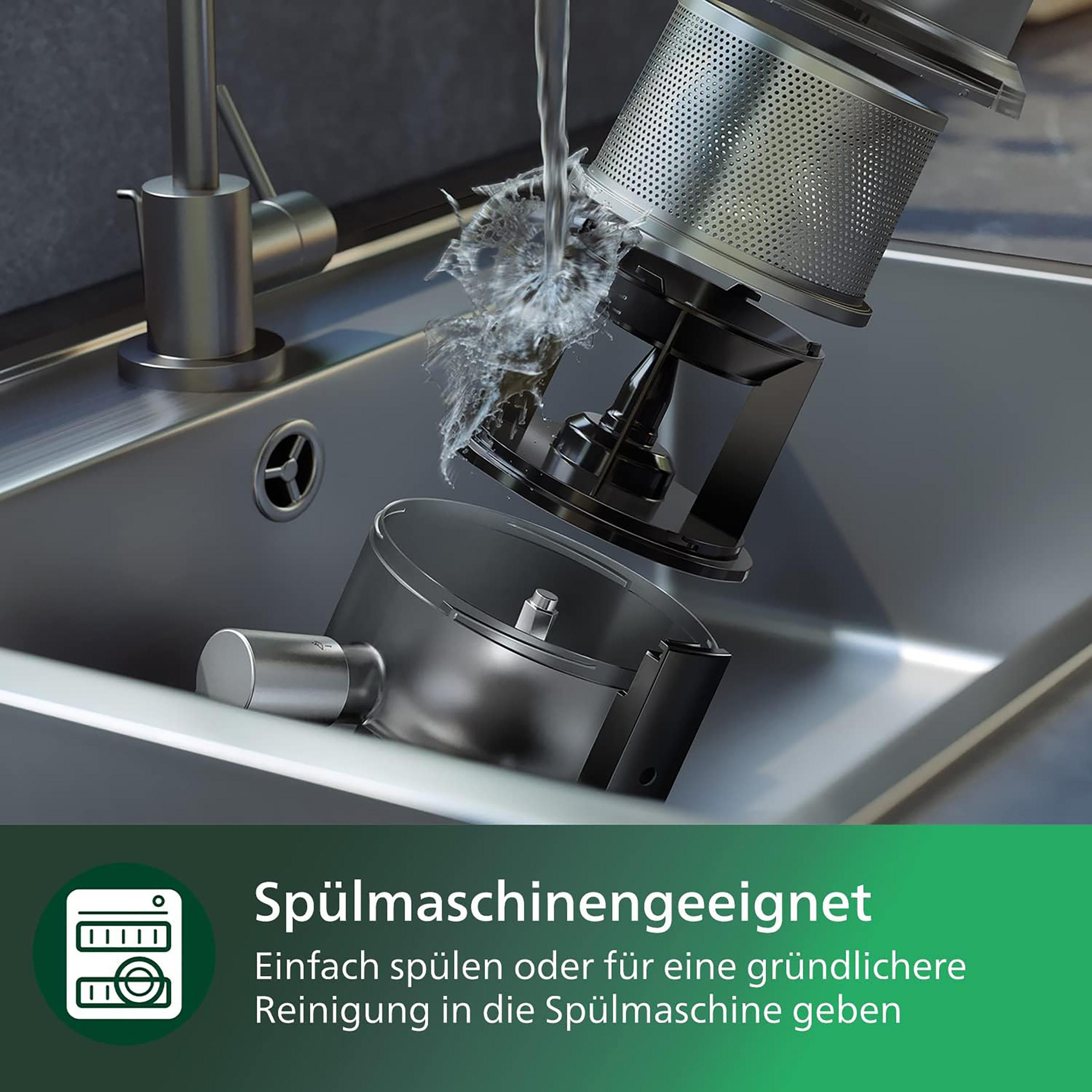 Edelstahlspüle mit Teilen eines zerlegten Staubsaugers.