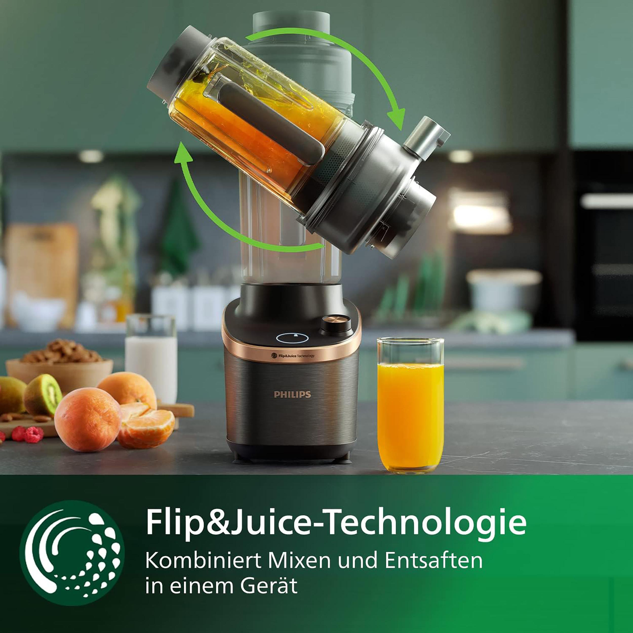 Ein Philips-Mixer mit Obst und Saft, der die Flip&Juice-Technologie zeigt, auf einer grünen und braunen Oberfläche.