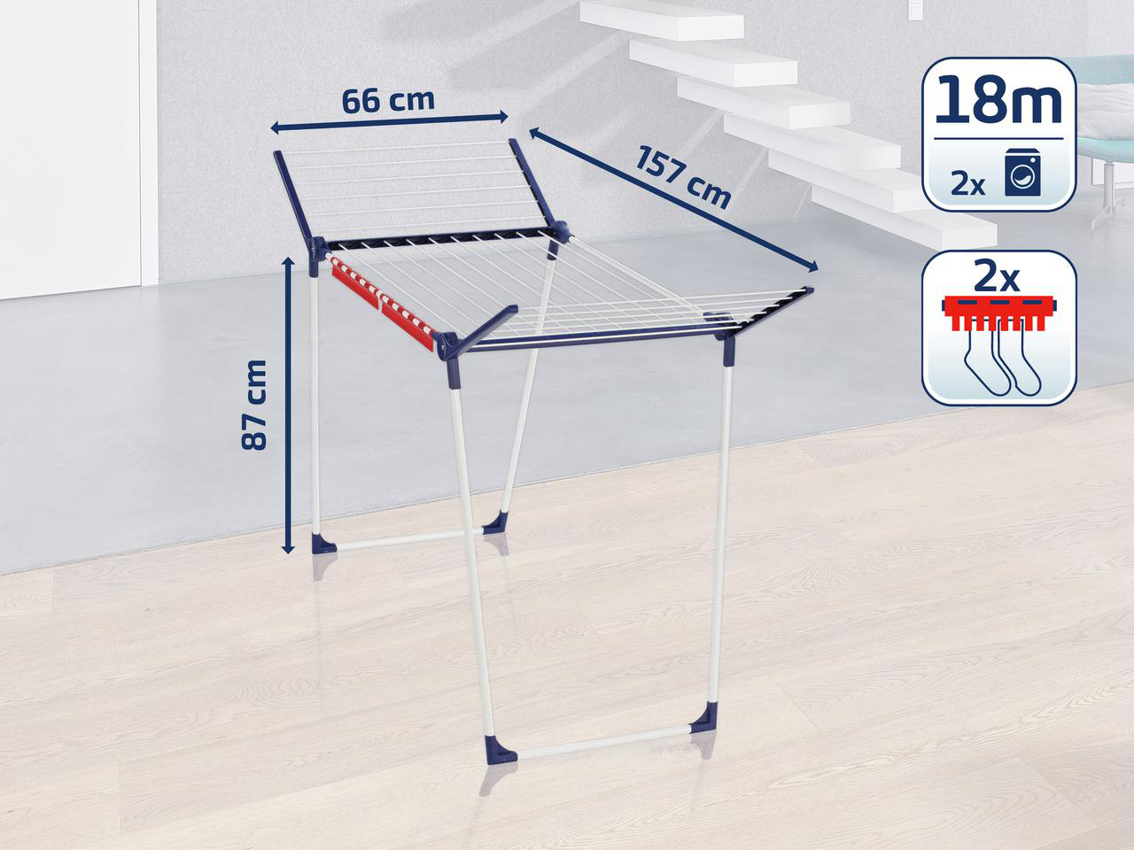 Wäscheständer mit Abmessungen, weiße, blaue und rote Details auf Holzboden.